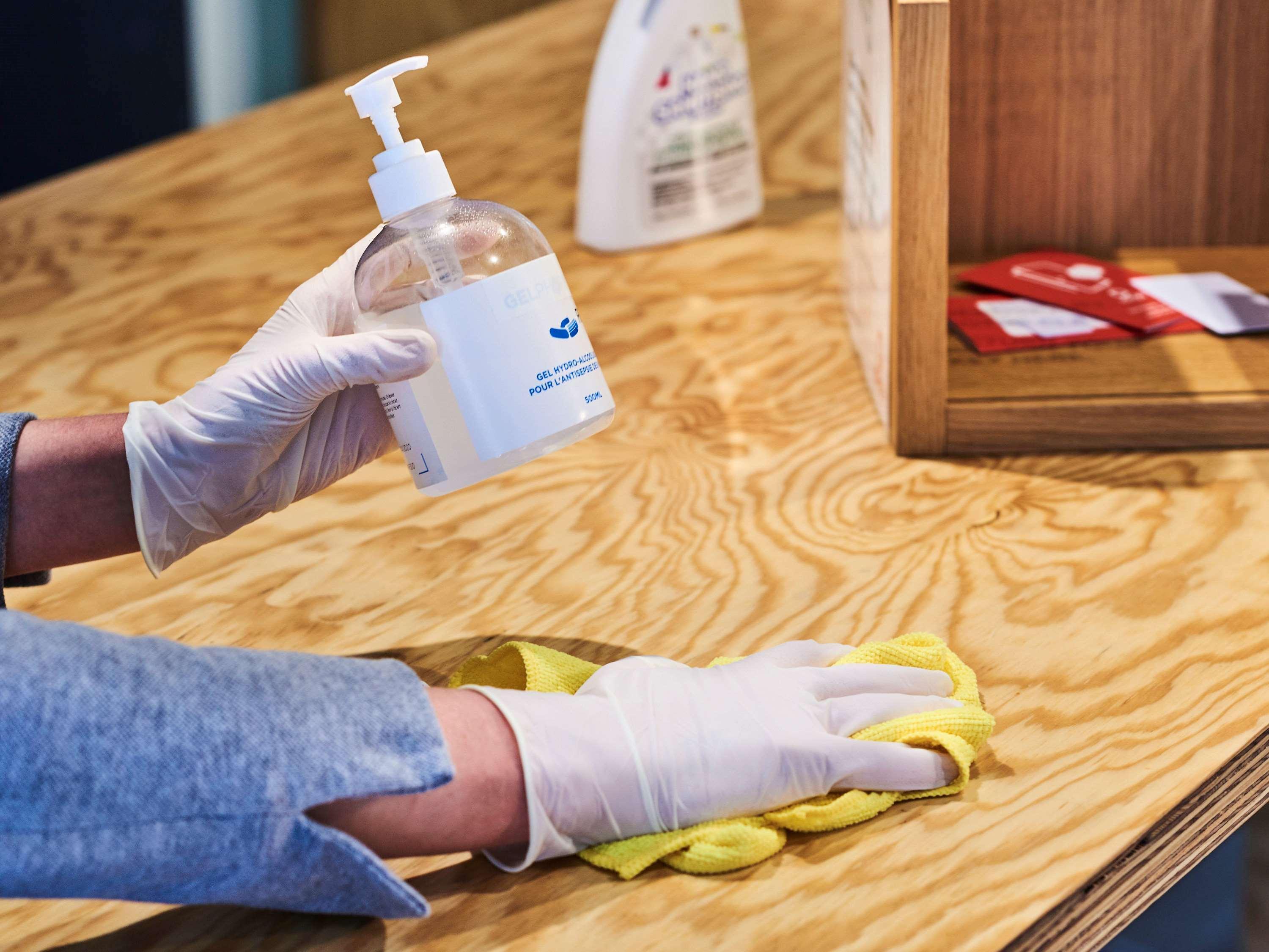 Novotel Chennai Sipcot Exterior foto Disinfection of a table with a disinfectant